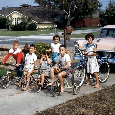 Neighborhood kids gather with their bikes in West Covina, California.