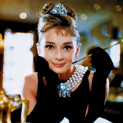 Audrey Hepburn stars as Holly Golightly in the 1961 film Breakfast At Tiffany's.