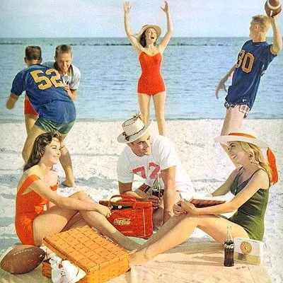 1961 Coca Cola ad depicting fun at the beach.