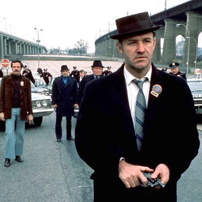 Gene Hackman stars as a New York City narcotics detective in the gritty film The French Connection. The film is directed by William Friedkin, part of the so called "New Hollywood" movement that emerged in the early 70's.