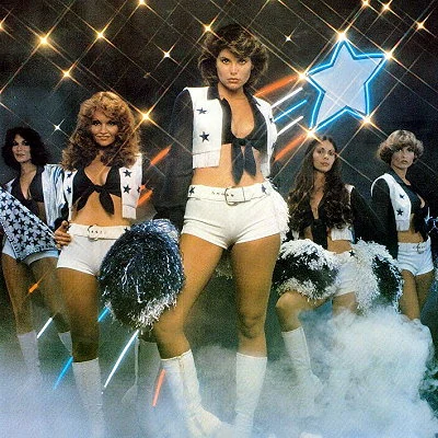 Adding a professional choreographer and new uniforms, with hot pants replacing the traditional skirt, the Dallas Cowboy Cheerleaders are marketed through a popular poster in 1977.
