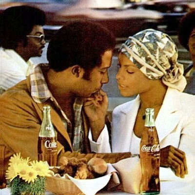 Detail from a 1977 Coke advertisement.