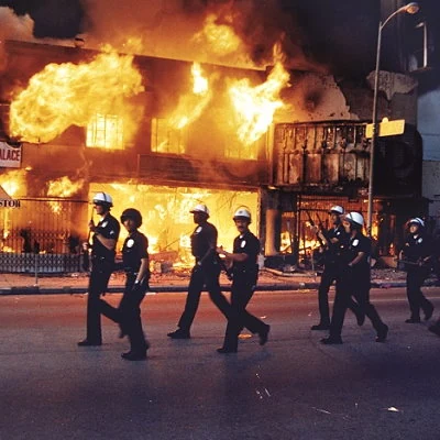 Riots occur in Los Angeles in April and May after a jury acquits four police officers of charges of Excessive Force in the widely televised arrest and beating of Rodney King. The riots result in over 12,000 arrests and 63 deaths.