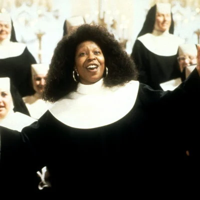 Whoopi Goldberg in the comedy film Sister Act about a lounge singer who goes into the witness protection program at a convent.