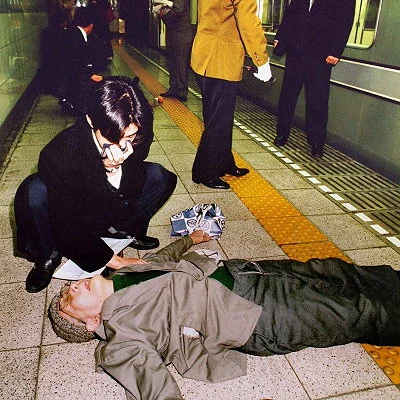 A nerve gas attack in a Tokyo, Japan subway injures thousands and kills eight. The Supreme Truth cult is behind the attack.