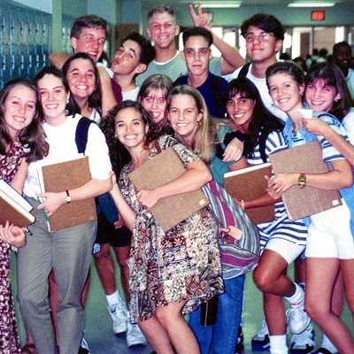 Florida high schoolers gather in the hallway for a photo.