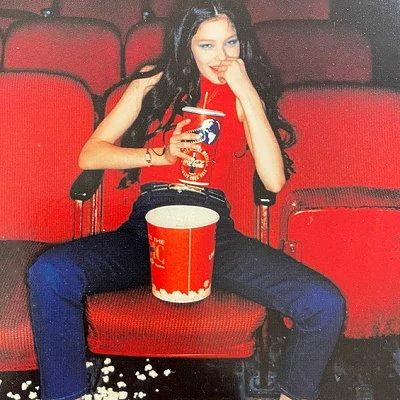 Detail from an advertisement for Guess Jeans.