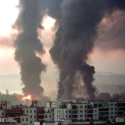 After Yugoslavia enters Kosovo to clamp down on the Kosovo Liberation Army and expel ethnic Albanians, NATO forces begin bombing the Yugoslavian capitol of Belgrade in March, eventually ending the conflict.
