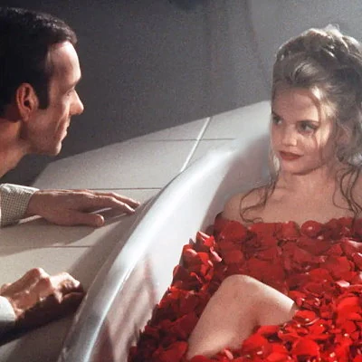 The black comedy drama American Beauty is about the mid-life crisis of an advertising executive, played by Kevin Spacey. The film also stars Mena Suvari. Annette Bening and Thora Birch. The film won Oscar's for Best Picture, along with Best Director for Mendes, Best Actor for Spacey, Best Original Screenplay and Best Cinematography.